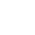 A white refrigerator freezer sitting on top of a green table.